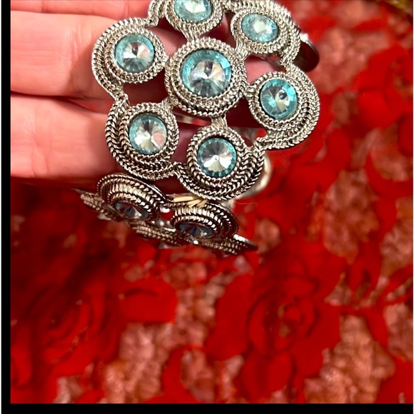 Jewelry - Two bracelets. One is stretch, Blue and silver and one has a clasp, tan and gold